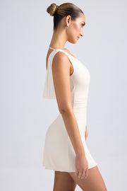 Oh Polly Tigen robe mini ivoire dos ouvert jersey