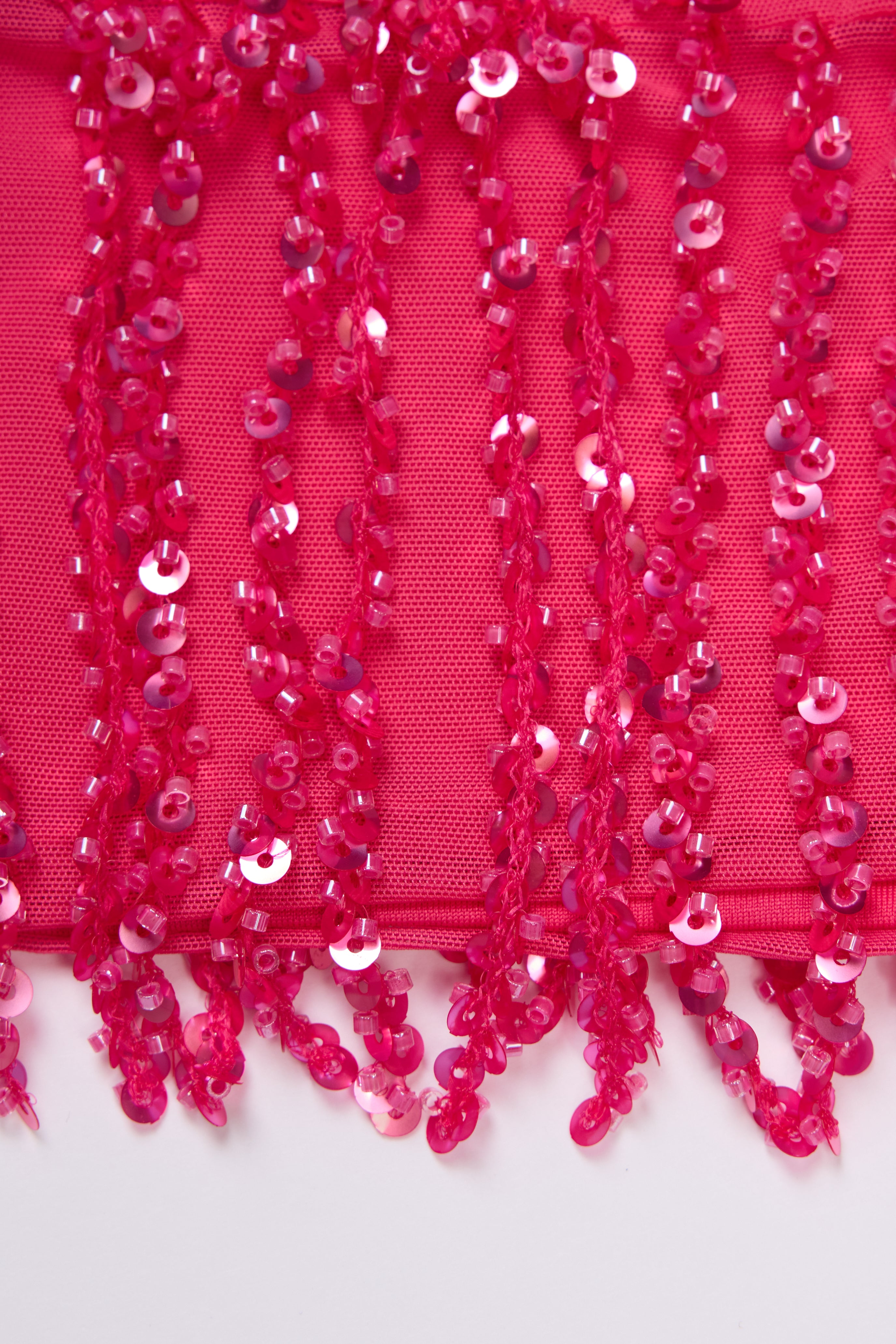 Oh Polly Nessa NS15005 jupe mini framboise à franges sequins