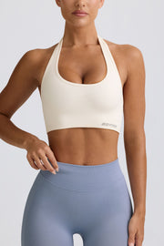 Oh Polly Define Luxe Halterneck brassière sport blanc maintien modéré