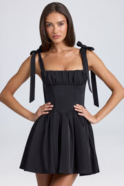 Oh Polly Draped Corset Mini Robe Noire Satin Dos Lacé