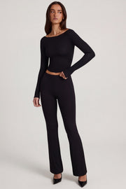 Oh Polly Vevina pantalon évasé noir taille mi-haute