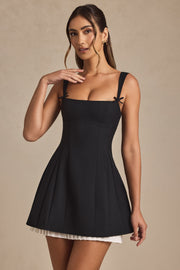 Oh Polly Cressida robe mini plissée noire noeud