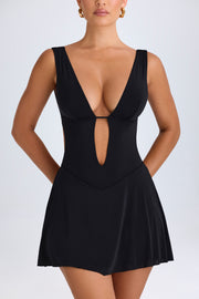 Oh Polly Kalista mini-robe noire dos ouvert décolleté