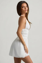 Oh Polly Kaelis Robe Mini Blanche Dos Croisé Évasée