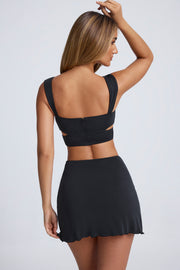 Oh Polly 8627 mini jupe noire trapèze ruchée