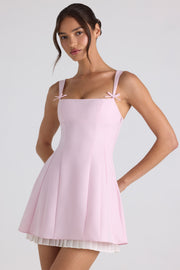 Oh Polly Cressida robe mini plissée rose clair noeud