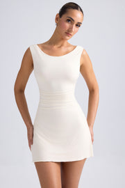Oh Polly Tigen robe mini ivoire dos ouvert jersey