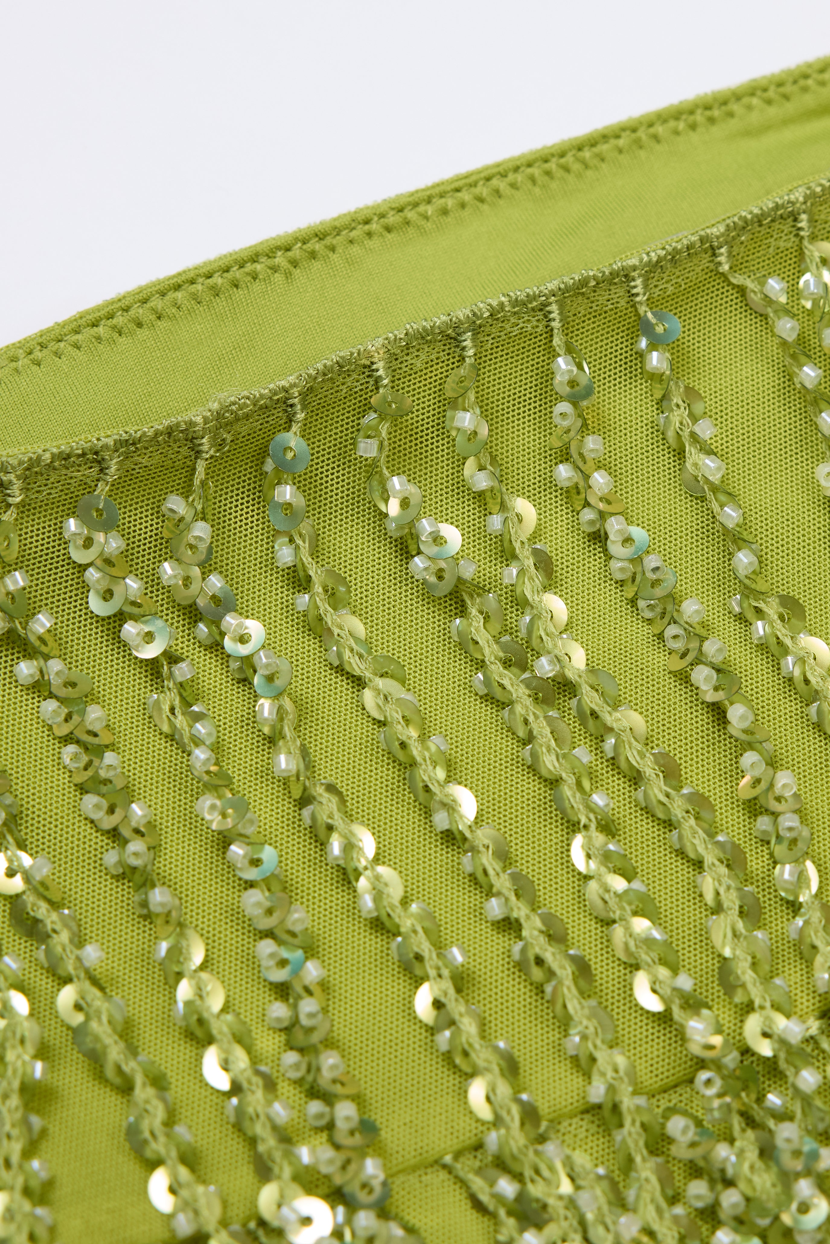 Oh Polly Nessa mini jupe franges Olive sequins taille basse