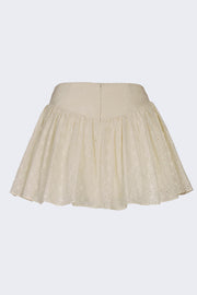 Oh Polly Thia jupe mini broderie ivoire nœuds