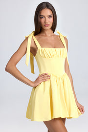 Oh Polly Draped Corset Mini Robe Jaune Satin Dos Lacé