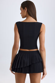 Oh Polly Nada 11517 mini jupe noire plissée taille basse