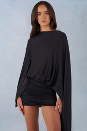 Oh Polly Cape mini robe jersey noire dos nu drapée
