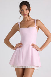 Oh Polly Cressida robe mini plissée rose clair noeud