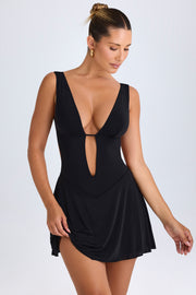 Oh Polly Kalista mini-robe noire dos ouvert décolleté