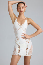 Oh Polly Tori robe mini ivoire licou strass dos nu