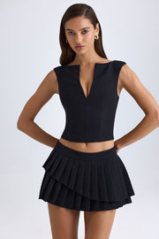 Oh Polly Nada 11517 mini jupe noire plissée taille basse