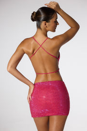 Oh Polly Cruz jupe mini rose fuchsia taille basse strass