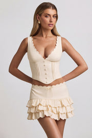 Oh Polly Lorena mini jupe ivoire volants taille basse