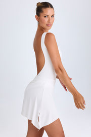 Oh Polly Shirin robe mini blanche dos nu moulante