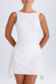 Oh Polly Shirin robe mini blanche dos nu moulante
