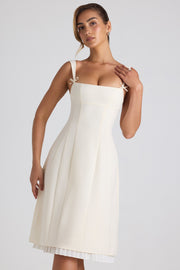 Oh Polly Isadora robe midi plissée ivoire col bardot