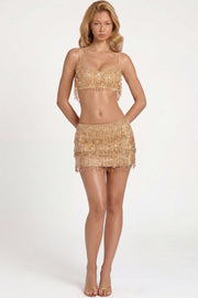 Oh Polly Skirts Nessa mini jupe dorée à franges perlées