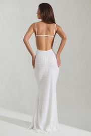 Oh Polly Nivalis robe maxi blanche dos nu à perles
