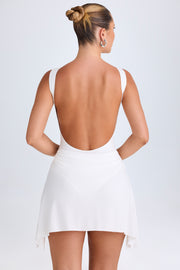 Oh Polly Shirin robe mini blanche dos nu moulante