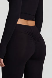 Oh Polly Vevina pantalon évasé noir taille mi-haute