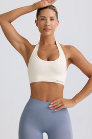 Oh Polly Define Luxe Halterneck brassière sport blanc maintien modéré