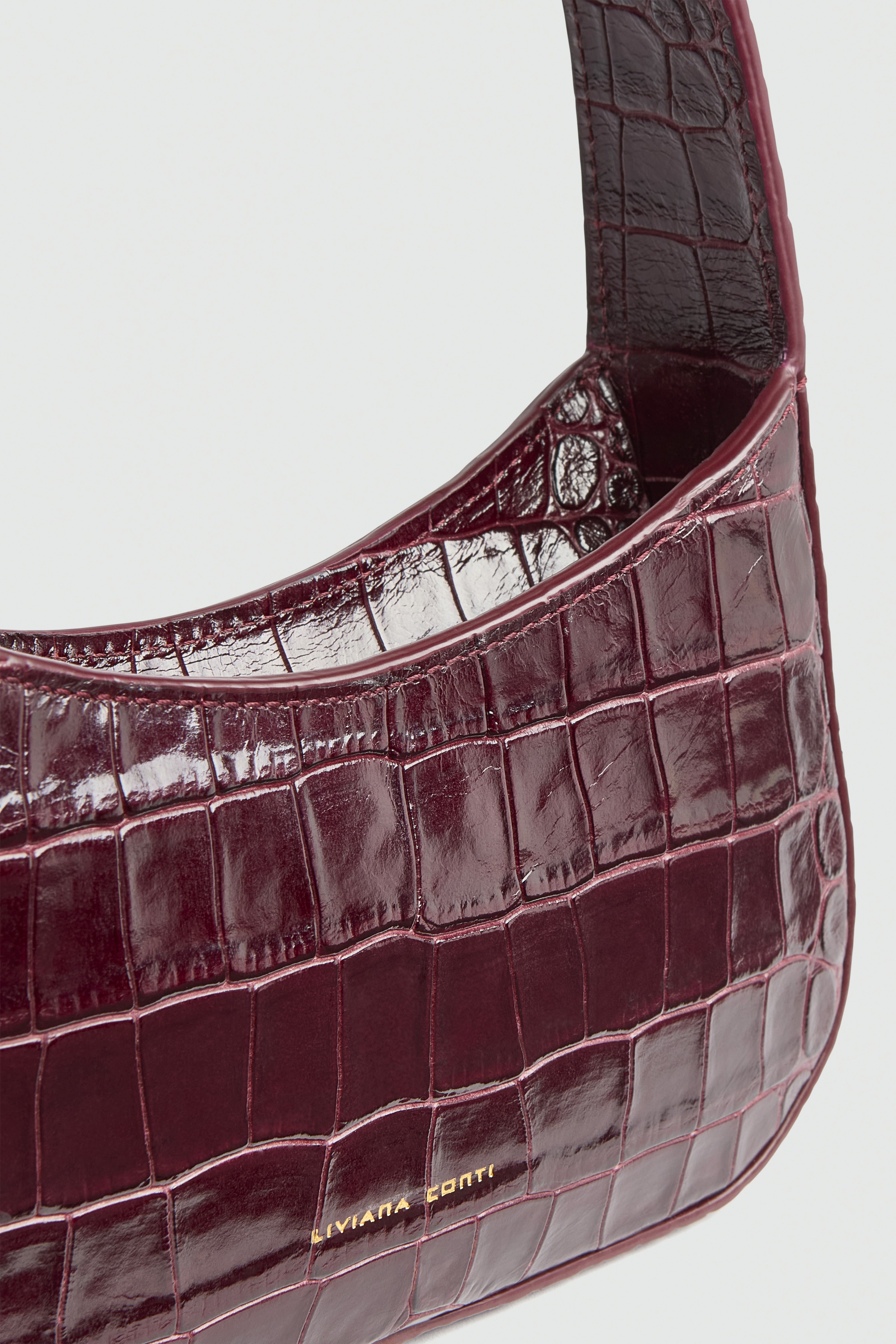 Liviana Conti Angel sac cuir aubergine croco