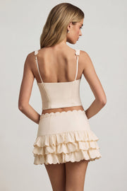Oh Polly Lorena mini jupe ivoire volants taille basse