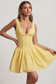 Oh Polly Sabina mini robe broderie jaune pastel nœud