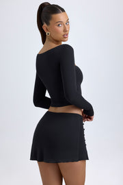 Oh Polly Dalla mini jupe noire taille basse modal