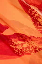 Oh Polly Taveuni robe maxi orange imprimé orchidée