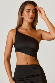 Oh Polly Brisa crop top noir asymétrique satin froncé